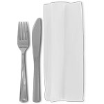 Silver Knife and Fork Rolled in a White Napkin